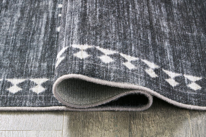 Arloman - 5' x 7' Rug - Black / Cream / Gray
